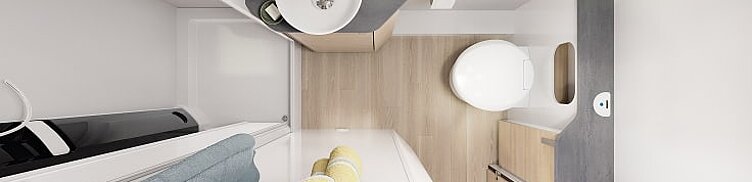 Innenansicht des Wohnmobils Hobby Maxia T mit Blickin das Badezimmer.